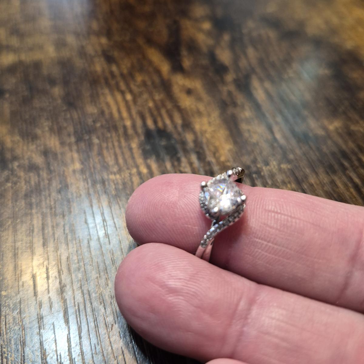 Elegant 925 Sterling Silver Ring with Zirconia Inlay Suitable for Daily And Gift Occasions, Valentine'S Day Jewelry, Hollowed Out Twisted Four Claw Circular Engagement Ring photo review